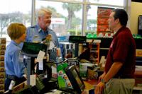 Citizens on Patrol Speaking with Store Worker