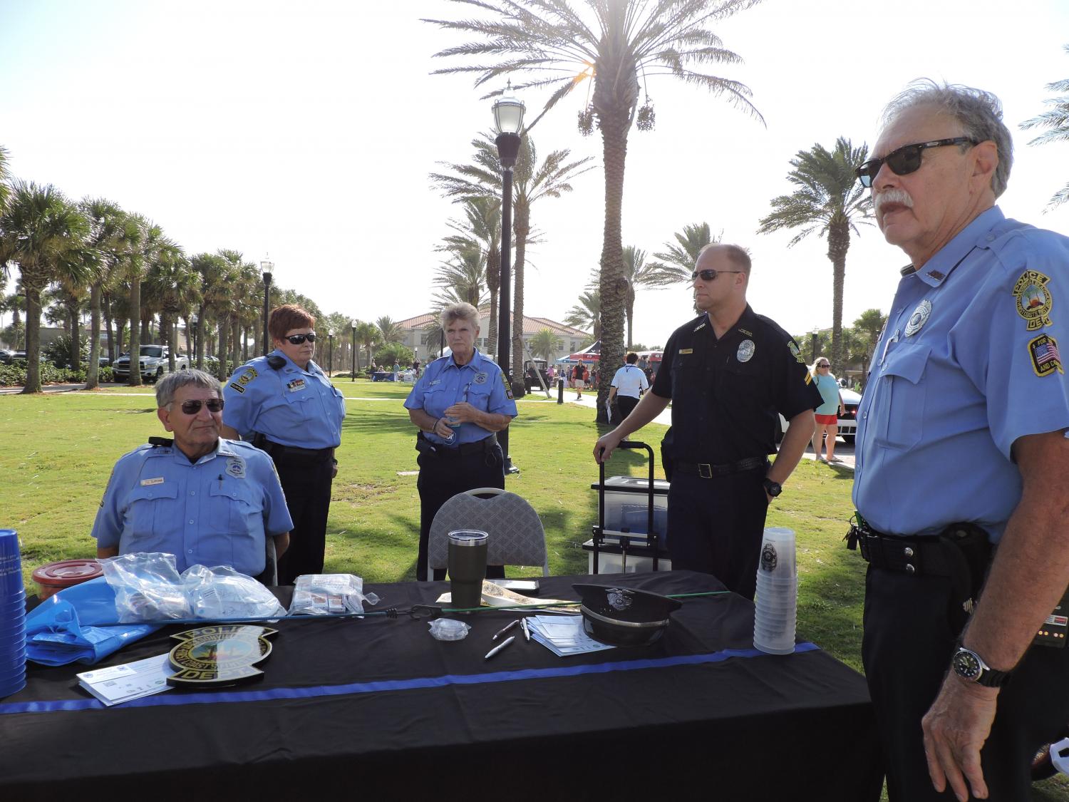 Police Officers Talking in a Group Outside