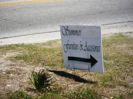 Signs for businesses placed on street corners that are against code.